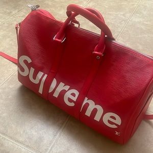 Authentic Louis Vuitton Supreme red duffle bag